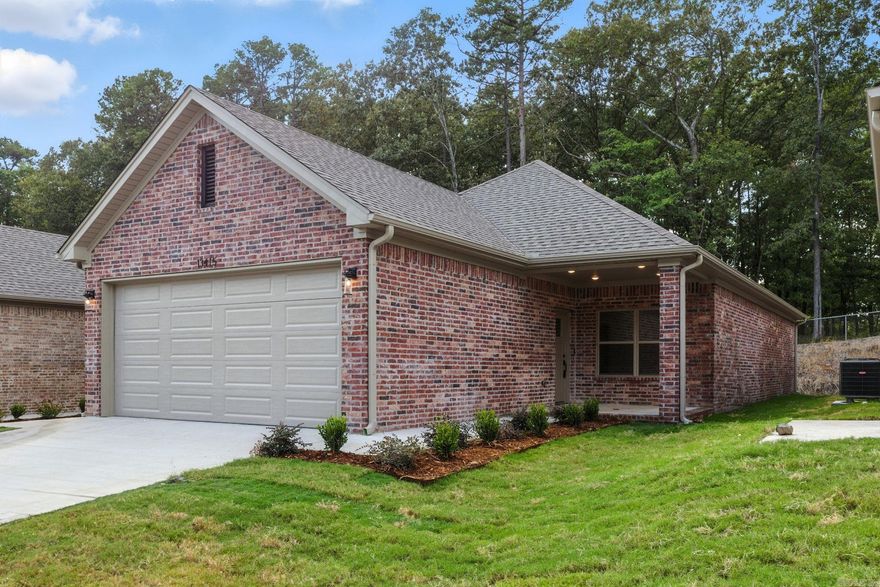 New construction home in the heart of West Little Rock for just $325K! Currently under construction, this thoughtfully designed single-family home offers a welcoming front porch and a spacious, open floor plan perfect for both everyday living and entertaining. The highlight of the layout is the private owner's suite, quietly tucked at the rear of the home with peaceful views of mature trees. You'll love the spa-like ensuite bath featuring dual vanities and an oversized walk-in closet with ample storage. Designer-selected finishes throughout will elevate every space with modern style and comfort. Located in a prime area close to shopping, dining, and top-rated schools, this home blends convenience and charm.  This home is under construction and set to be complete in March/April. Pictures shown are of an identical property.