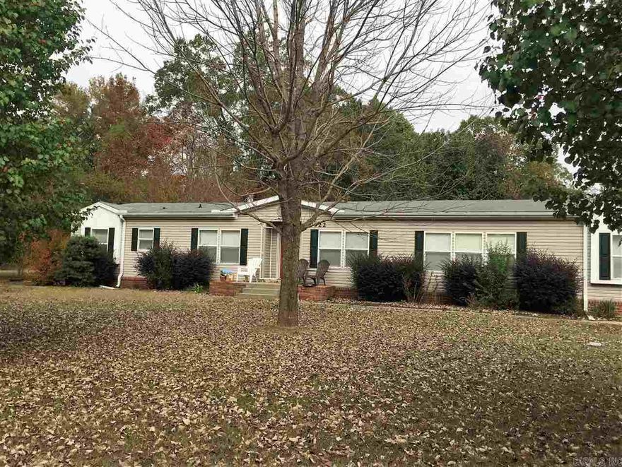 4 bedroom mobile home on 60 acres m/l w/ shop and pond.