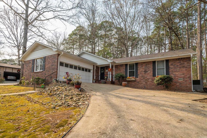 A nice solid home on a shady lot and relaxing environment.  You will love the warmth created by the rustic feeling of the living room or enjoy a book in the sunroom overlooking the back yard.  This all brick home needs nothing but a new owner to love it!