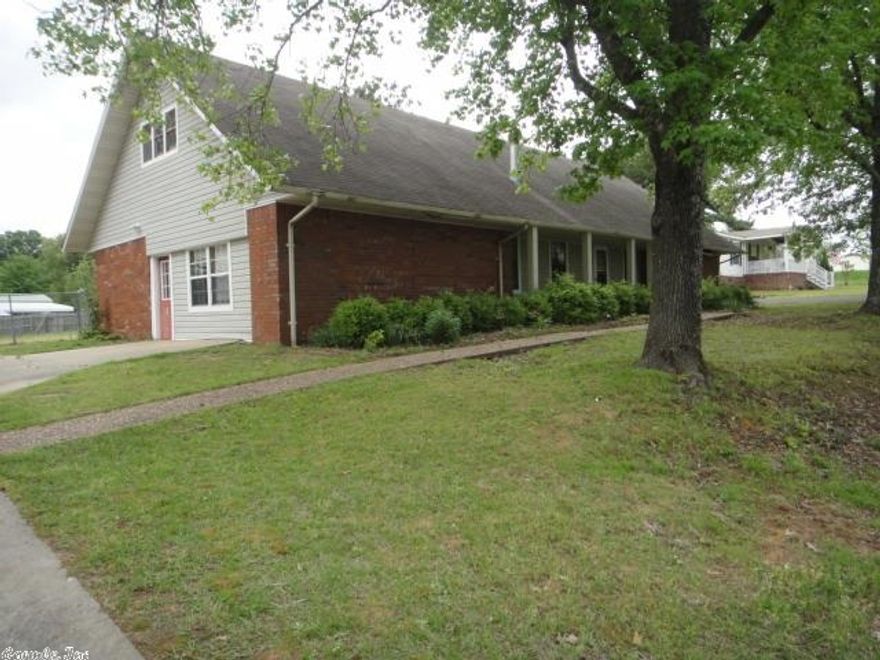 Plenty of space in this 1 1/2 story home. Needs some updating. Double car garage converted into large den. Large living room, spacious bedrooms and a fourth bedroom upstairs.  Large fenced-in back yard with spacious wood deck. Seller is offering a selling agent bonus of $1000 if this closes by 1/3/15.