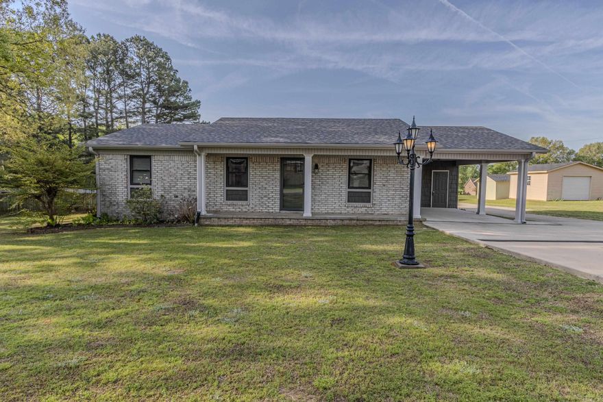 Well maintained home with a versatile shop setup--perfect for anyone needing extra workspace!  Inside features updated kitchen cabinets, corian countertops, and a cozy eat-in kitchen.  The hall bath has been updated with a walk in shower and glass enclosure.  The primary bedroom offers a half bath and walk -in closet.  Additional updates include windows, shingles, exterior security doors, and a concrete driveway.  Washer & Dryer and refrigerator remain with the property.  Enjoy the relaxing aprx 16 x 20 covered patio with ceiling fan and sunshade, plus front yard sprinklers and a mostly fenced backyard.  The standout feature is the aprx 30 x 30 shop with a 16 x 30 lean-to.  It includes a heated and cooled kitchen area with french doors to the patio, storm shelter, flue, commode room, propane heater, air compressor---making it ideal for hobbies, work, or entertaining.    If your dream is to own a shop, don't miss this one--schedule your showing!