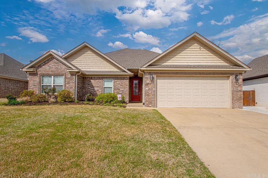 Welcome to your exquisite estate, where luxury meets comfort in this impeccably maintained 4 bedroom, 2 bathroom residence.  Step inside to an inviting open-concept living space, where natural light pours in, highlighting the seamless flow between the kitchen, dining, & living areas. The chef’s kitchen boasts sleek stainless steel appliances, abundant cabinetry, & expansive countertops, perfect for culinary creations & entertaining. The expansive pantry offers ample storage & organization. The stunning all-brick gas FP, framed by custom built-ins, serves as the elegant centerpiece of the living space, combining timeless charm with functionality. Retreat to the serene primary suite, offering a spa-like ensuite & generous closet space. Spacious guest rooms provide versatility & comfort. Outside, the meticulously landscaped grounds create a private oasis for relaxation in the expansive fully fenced backyard. Outdoor storage building conveys. Conveniently, right inside the garage is the ultimate "man cave" - 234 sq ft, heated & cooled with electricity! This stunning home offers the perfect balance of sophistication & warmth. New roof '21. Extra concrete added to driveway & patio area.