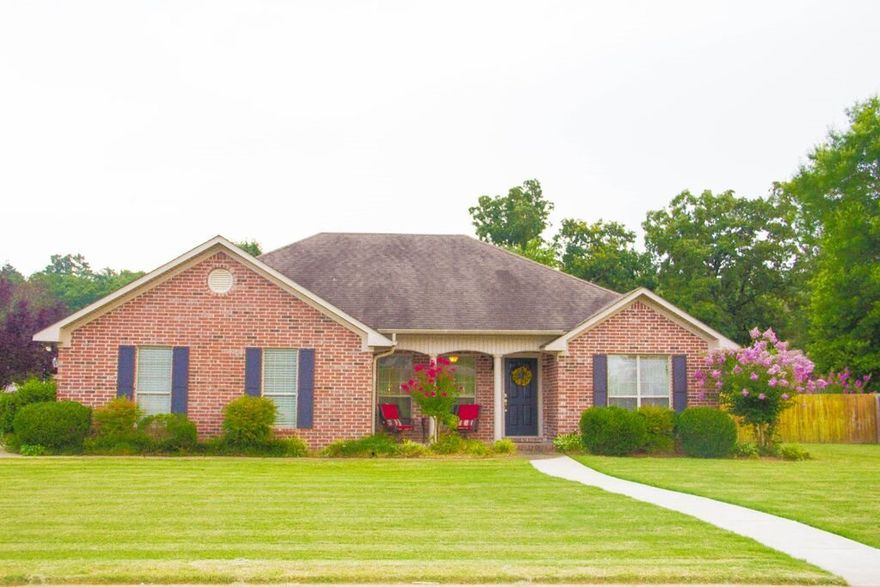 Extremely clean and well kept home on a beautiful corner lot in the award winning Ellen Smith Elementary school zone! The open and spacious living room flows nicely into a sitting area/home office. The beautiful kitchen features dark cabinets and a stainless steel fridge that stays. The master suite with tray ceilings is gorgeous! New privacy fence, new sidewalk leading to the mailbox were recently added by the seller.