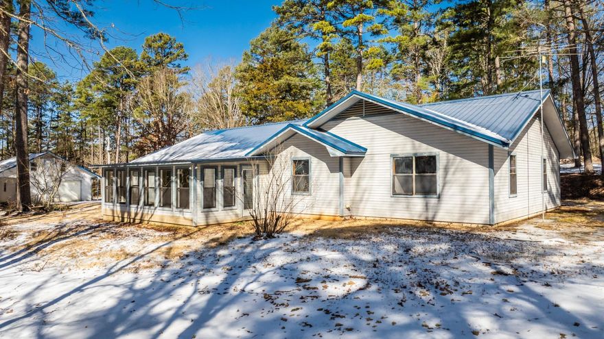 Hard to find hidden oasis. This nice property is secluded but minutes to schools and shopping. Large home with room for everyone. Huge sunroom/mutli purpose room. Must see to apprecaiate all this lovely property has to offer. Large shop with electricity and plumbing. Beautiful mature trees all on 2.68 acres