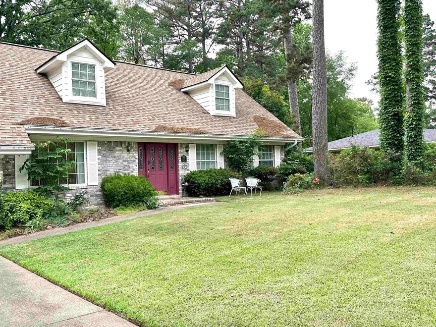 Some of the best living in Malvern city limits outside, Royal Oaks Subdivision. This 2 story home comes with lots of love, a new roof and a neighboring vacant lot designated as a Overton Park. Dual zoned HVAC systems, formal living & a large den with wood burning fireplace (gas insert presently)  for two living spaces on either end of the first level. Eat in kitchen plus dining area connecting kitchen to front entry. Primary bedroom with bath on the main level. 3 car garage with tool room & 2 auto roll up doors. Solid build cutsom home with large covered back porch facing a wooded view. Chain link fenced dog run or garden space, let your imagination go! Priced under recent sales for buyer to replace flooring and spruce up after close, no need to deduct from price it has been done for you. Extra adjacent parcel 120X150 included, parcel #700-05821-000, this has monument for Overton Park and very special. Total of .81 acre included in this price.