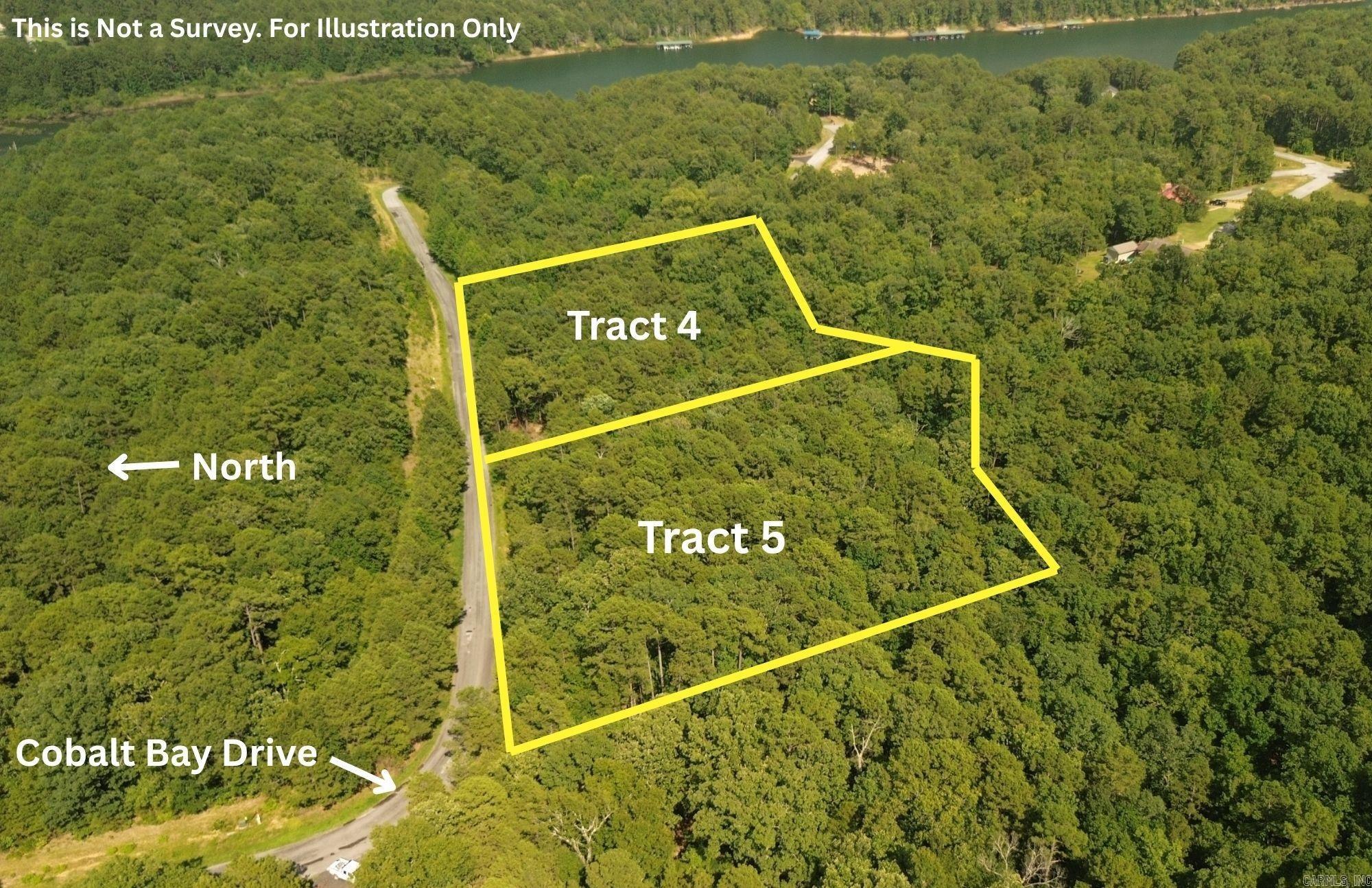 3 Acre Lot Near Greers Ferry Lake with deeded access to Lake Tree covered lot with small clearing with an additional adjoining 3 acre lot. Utilities are at the road with approximately 271 ft of frontage on Cobalt Bay Drive. Not in Cobalt Bay Subdivision. No mobiles allowed.