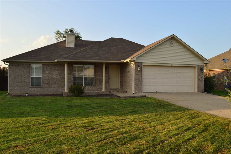 Very well maintained home in move in condition.  Amenities include laminate flooring in the living area and hallways, carpeted bedrooms, tile in the wet areas, a wood burning fireplace, four year old carpet, stove and paint along with a split bedroom plan. Outdoor amenities include a fully fenced oversized backyard, a large back deck and gutters. Home qualifies for 100% financing.  RE taxes do not reflect the homestead credit. Don't miss this opportunity!