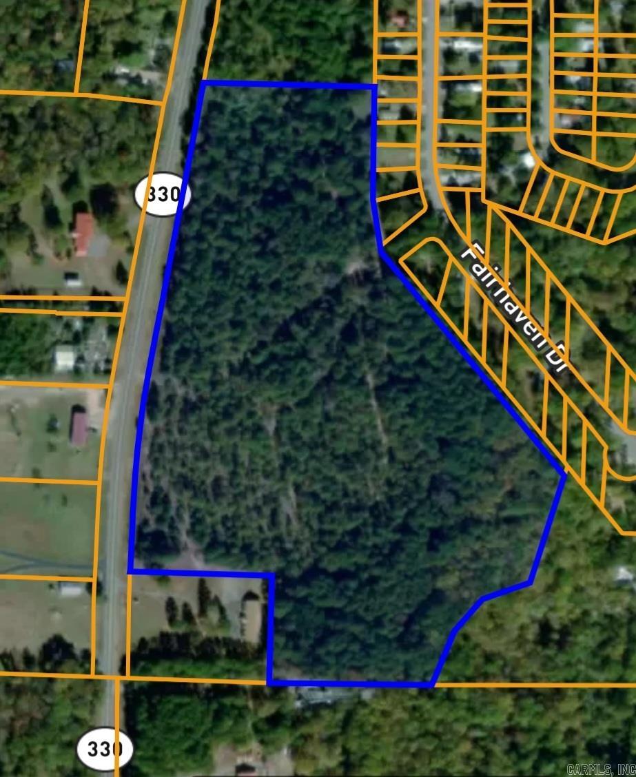 This 27.46 (+/-) acres is perfect for someone who wants to build their new home by Greers Ferry Lake in Fairfield Bay of Van Buren County. It is 4 minutes from Fairfield Bay public boat launch!! It is a hidden gem that anyone would want to escape to! Manufactured homes allowed but no tiny or mobile homes. Water and electric at the road. Call or text today for more info!