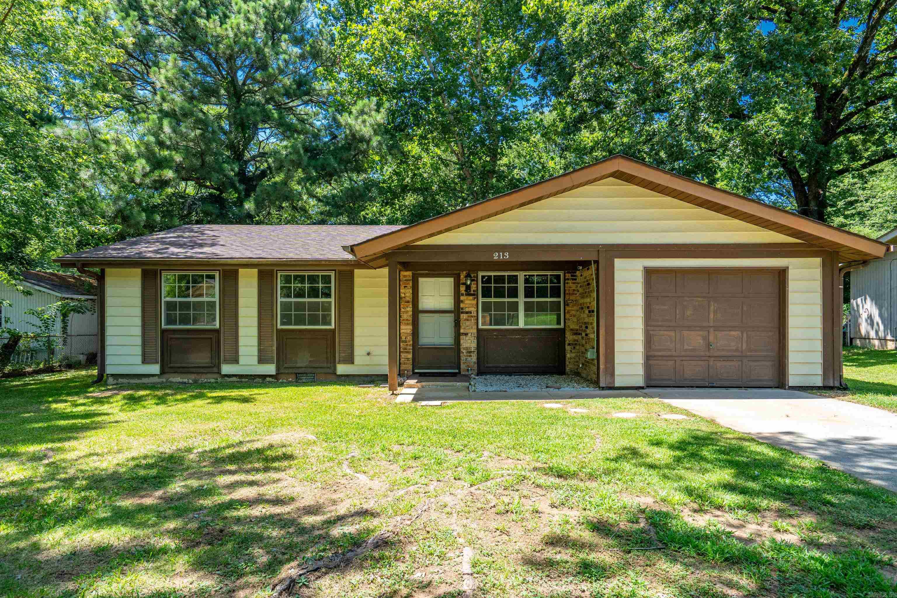 Charming and cozy- move in ready. This beautifully remodeled 3 bedroom, 1 bath home is full of charm and ready for its next owner. Located in the desirable Lake Hamilton School District. Recent updates include a newer roof, updated flooring, stylish countertops, modern light fixtures, a updated bathroom and fresh interior paint throughout. You will appreciate the spacious screened-in porch, perfect for outdoor living, The property features a large storage building and a fully fenced backyard, ideal for kids or pets. Don't miss your chance to move before school starts, schedule your private showing today!