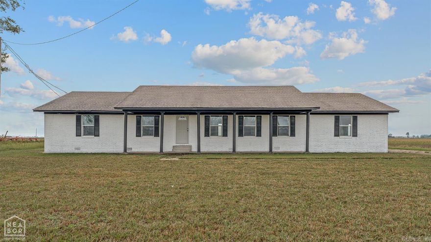 Completely renovated and move-in ready! This beautiful 3 bedroom, 2 bath ranch offers 2,240 sq ft of living space on a .41  acre lot with a stunning view. Featuring a spacious open concept design with laminate floors throughout the main living area,  carpeted bedrooms, and neutral colors to complement any dcor. Great curb appeal welcomes you with a charming covered  front porch, while inside you'll enjoy a cozy wood burning fireplace and large living spaces perfect for gatherings. Outside, a  2-car carport and plenty of room to relax or entertain complete this home.