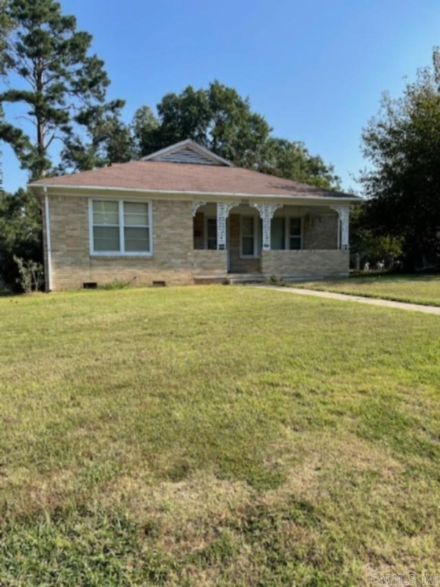 Adorable, well-loved home in the heart of Malvern near everything! Nice sized living room and wonderful retro bathrooms in awesome shape! Sweet front porch freshly painted and large yard for your enjoyment. Large shop area with garage and storm shelter steps away from the home. Has central heat and air but owner was older and wanted backup so there are also window units and space heaters if case! No disclosure as seller has never occupied home. Call today!