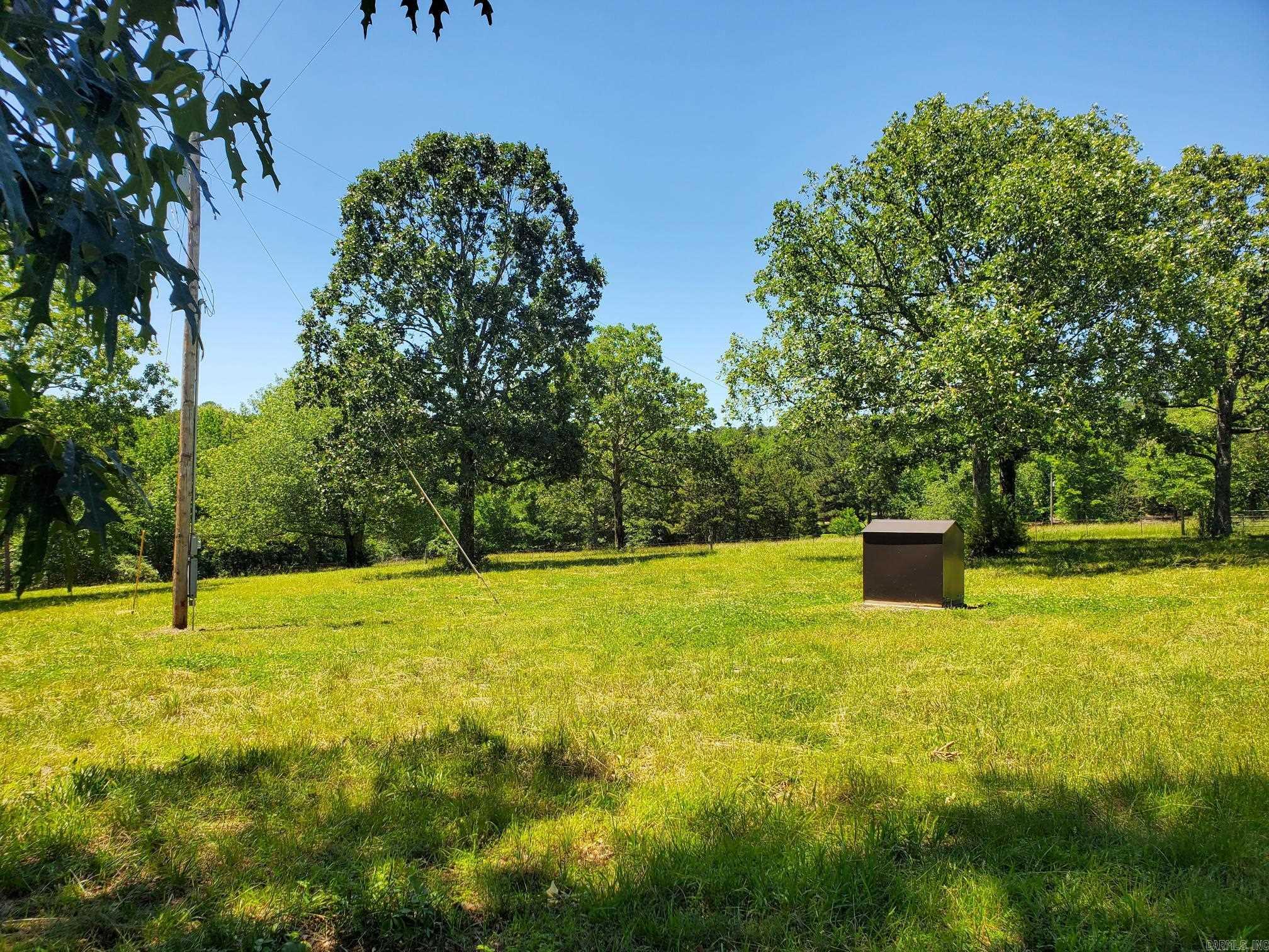 Beautiful 3+ Acres with electricity, well, and septic tank. Shed/Pole Barn. Shipping container (7 x 12'). 200 Amp service. 1000 gallon septic tank. Wet weather creek. Build Your Dream Home on 3+ Acres! Looking for the perfect place to start your next chapter? This beautiful 3+ acre property has everything you need to get started right away: Well, septic, and electricity already installed – save time and money! Pole barn on site – perfect for storage, workshop, or hobby space. Wooded and open land – ready for your custom home, modular, or RV setup. Peaceful rural setting – enjoy country living with room to breathe. Whether you're ready to build now or planning for the future, this property is a rare find. Just bring your plans and start building!