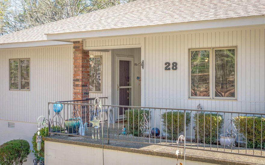 Downsize Your Chores, Upsize Your Fun: Easy Living in Hot Springs Village.This Majorca Courts townhouse offers the perfect blend of convenience and comfort.  Enjoy all of the nearby amenities and relax in your spacious, one-level home with a beautiful wooded view. This lovely home is steps away from peaceful Lake Pineda (you can see the lake from the back deck in the winter) and a quick drive to the fitness center and Lake Coronado. Plenty of storage and includes a beautiful deck. Featuring an owners suite with a walk-in closet and shower, a well-equipped kitchen, luxury vinyl plank floors and a two-car garage. Lawn care is handled, so you can start enjoying all that Hot Springs Village has to offer immediately including 9 golf courses, Lakes, scenic views and endless recreational opportunities. HVAC is 2022, Roof 2017, exterior paint 2024, Appliances 2020. Located in the Heart of the community don't miss this gem. Agents see remarks.