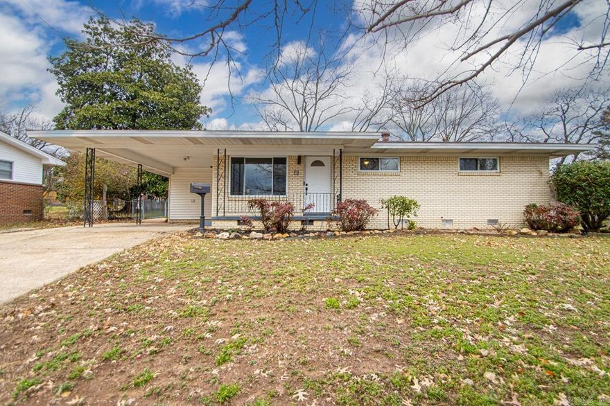 This beautiful 3 Bed 1.5 bath is ready to become a home! Fresh paint throughout, new flooring, new appliances, new lighting and fixtures. You will love the large overhangs giving mid century modern vibes. A few of the best features are the updated windows, downtown skyline views, cozy backyard with a covered patio,  and the 2nd living / den with  fireplace. The home has original hardwoods, tile, and luxury vinyl plank. This is a must see - check it out today!