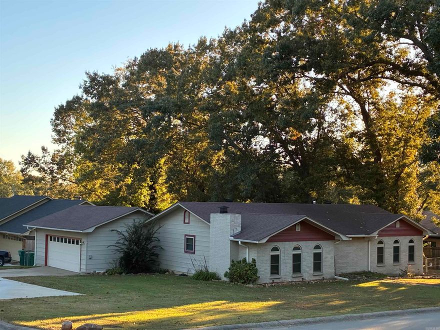 Very solid 3 bedroom/2 bath home, exceptionally well cared for with low utilities.  New: heat/air, ductwork, hot water heater 2018, roof shingles 2018, carpet 2023 and hardwood floors, insulated windows 2017, kitchen remodeled with new range, dishwasher and vent-a-hood 2026, freshly painted throughout the home.  A two-car garage, plus, 38x20 RV parking pad.  12x20 Morgan building with lights and outlets.  A well-maintained yard with fenced backyard and outdoor space.