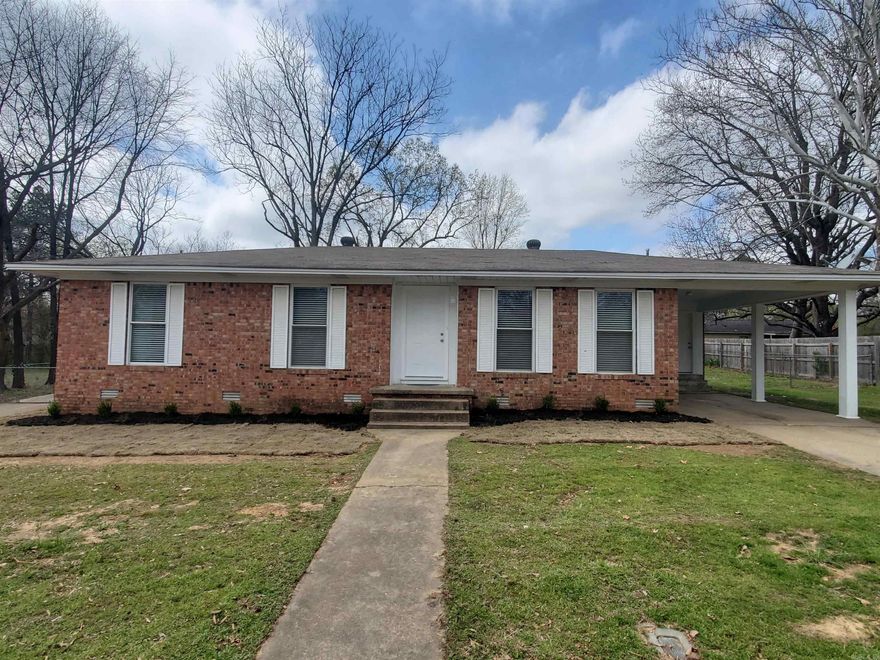 WOW! Updated 3 bedroom 2 full bath home with all new paint, flooring, appliances, custom kitchen with granite counter tops, separate laundry room, large covered patio and fenced back yard.