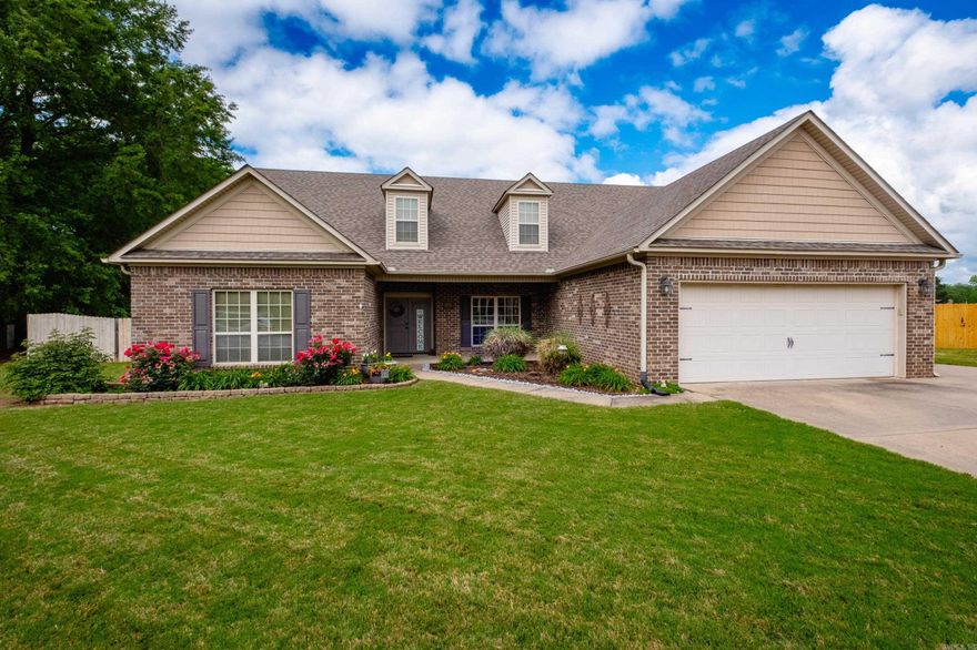 Welcome to 3412 N. Cresent Drive – a spacious and beautifully maintained home with a convenient access to both Bryant and Little Rock!  This versatile 5-bedroom, 3-bath home offers flexible living with the main level featuring a bright and inviting family room with a cozy gas log fireplace, a formal dining room perfect for gatherings, and an eat-in kitchen complete with a stylish backsplash, ample counter space, and plenty of cabinetry.  The primary suite is a true retreat, boasting a serene view of the backyard and a private en suite bath. Three additional bedrooms and another full bath are conveniently located on the main floor. Upstairs, you’ll find a spacious 5th bedroom or bonus room with its own full bath—ideal for guests, a home office, or playroom.  Enjoy outdoor living at its best in the fully fenced backyard, which includes a swing set, a built-in outdoor fireplace, a seating area, and a quaint covered patio—perfect for relaxing or entertaining. With spectacular views from each corner of your private oasis, you’ll want to spend all your time outdoors! The spacious two-car garage also features a built-in storm shelter for added peace of mind.  This home truly has it all!