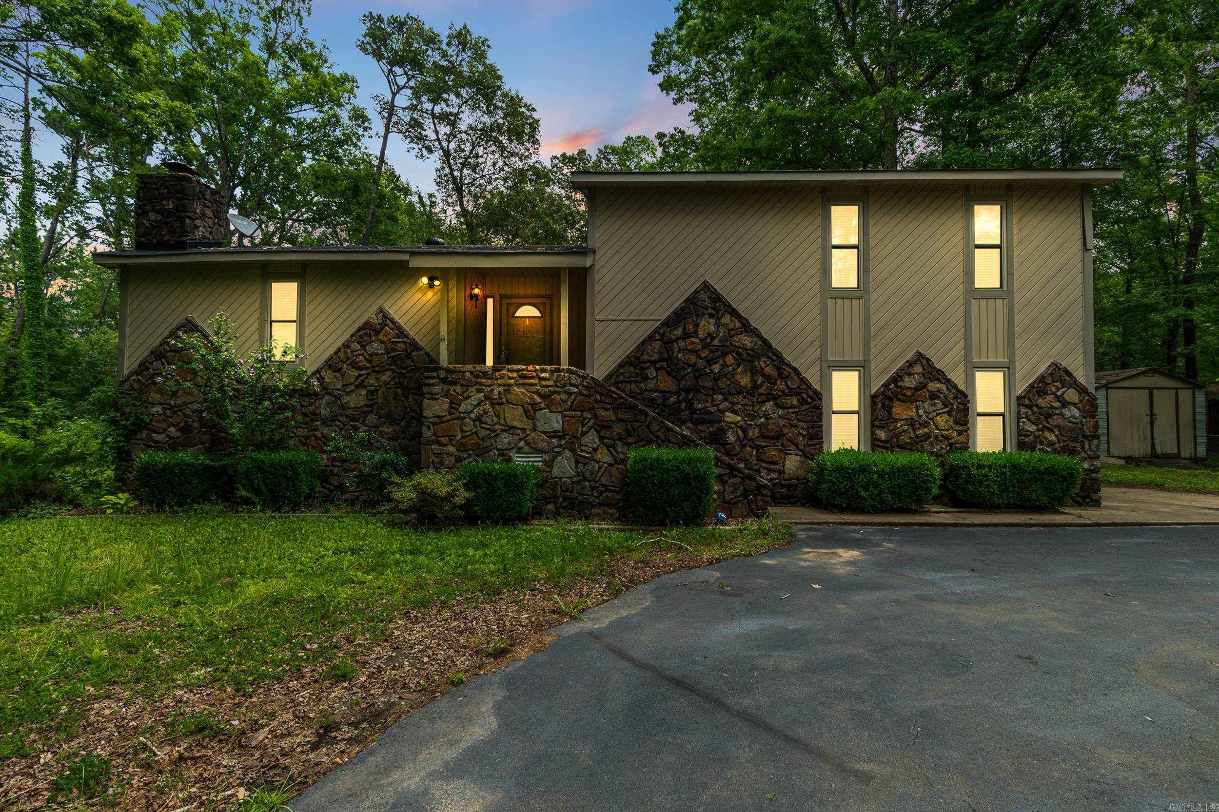 Welcome to 15919 Bluff Ln in Mabelvale! This charming 4-bed, 2-bath tri-level home sits on a peaceful 2.25-acre lot and offers 1,940 sq ft of flexible living space. The main level features an open-concept living and dining area with a cozy rock fireplace, while the kitchen includes ample cabinetry and essential appliances. Upstairs, you’ll find three bedrooms and a full bath. Downstairs offers a spacious bonus room that can serve as a fourth bedroom, game room, or office, plus an extra flex space for storage or hobbies. Built in 1978, this home features central electric HVAC and plenty of parking. Located in Ramble Estates East, it combines the serenity of country living with convenient access to city amenities. If you’re looking for space, comfort, and flexibility, this home has it all!