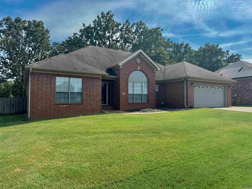 301 Pumice is your Stonehill sanctuary, ready to welcome you home with modern space and comfort. This one-level, four-bedroom home in Sherwood offers over 2,200 sq. ft. of smartly designed, all-brick living space that balances open gathering areas with private retreats. Built in 2005, it features laminate and tile flooring, a welcoming living room with fireplace,  updated HVAC and thermostat (2023), kitchen appliances and new paint throughout in 2021. A finished garage and 10,019 sq. ft. lot with fenced backyard add everyday convenience, while the covered patio invites easy outdoor living. Unlike many nearby new builds with smaller footprints, this home offers generous square footage and established quality—at a value that stands out in today’s Sherwood market. Move-in ready and competitively priced, it’s a rare opportunity you won’t want to miss.