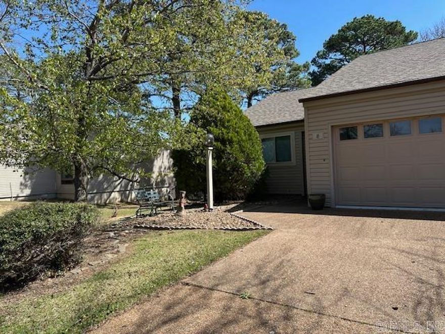 This two-bedroom, two-bathroom condominium, partially furnished, is located in the esteemed Country Club Ridge community of Fairfield Bay. It presents an ideal opportunity for use as either a vacation retreat or a permanent residence. The property boasts an open floor plan and a screened sunroom offering views of the golf course—an inviting space to enjoy morning coffee or unwind in the evening. Each spacious bedroom includes an en suite bathroom, providing privacy and convenience. Additional features include a large walk-in storage area accessible via exterior stairs at the rear, as well as an outdoor space furnished with a table and chairs, which could be made suitable for relaxation and appreciating the surroundings. The unit is conveniently situated only minutes from Greers Ferry Lake, Fairfield Bay Marina, the city center, hotel, conference center, and is positioned directly on the ninth hole of the Indian Hills Golf Course. Residents have access to an array of amenities, including bowling, miniature golf, three swimming pools, hiking and biking trails, restaurants, and more, enhancing the overall living experience within Fairfield Bay. INSIDE PICS COMING!