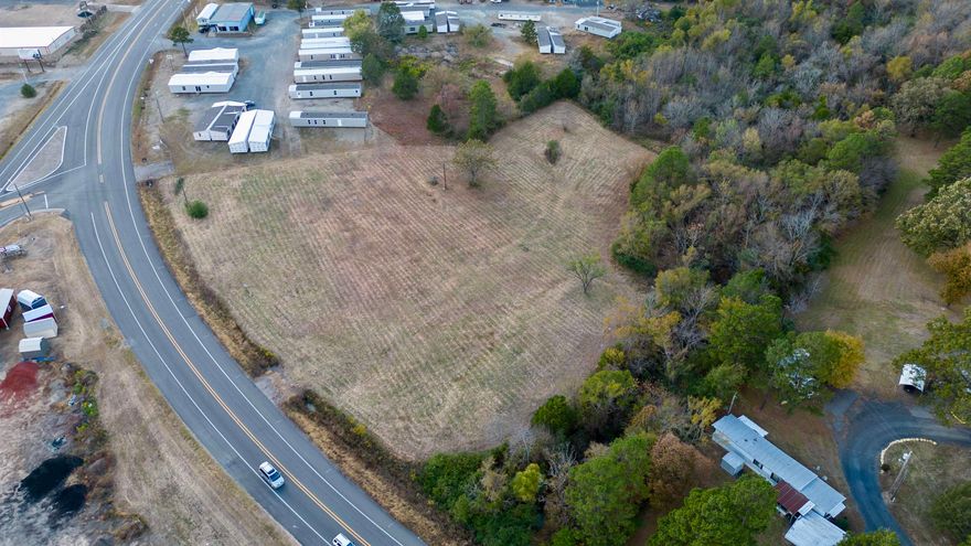 Awesome opportunity! This 3.3-acre commercial lot is located in the heart of Mena. Highway 71 frontage! Located at the intersection of HWY 88E and 71. City water, sewer, and electric hookups are available. Great buildable lot for new construction. Would be an awesome spot for a hotel!! Easy to navigate to, and minutes away from Main Street.