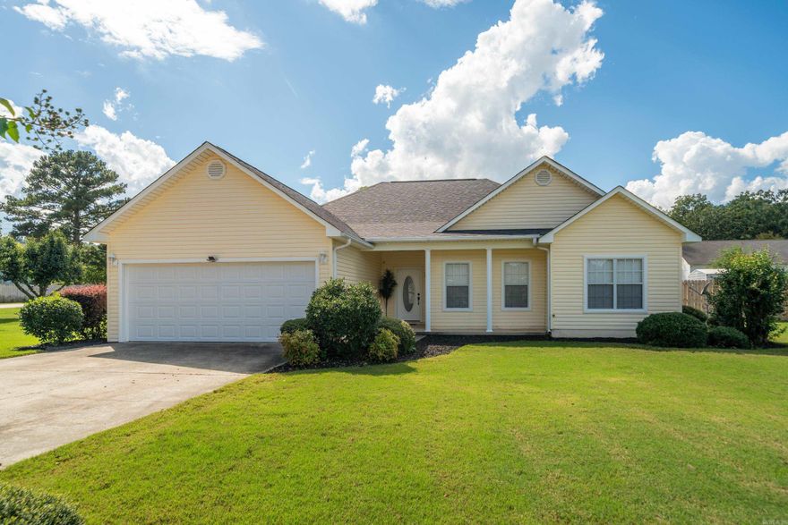 Beautifully updated 3-bedroom, 2-bath home offering 1,868 square feet of comfortable living space. Built in 2005 and situated on a large corner lot, this property features a brand-new privacy fence (2025), a new roof (2025), and a new garage door (2025). The HVAC unit was replaced in 2023 for added peace of mind. Inside, enjoy fresh paint, new flooring, and stylish new fixtures throughout. The kitchen has been tastefully updated with modern countertops and new appliances. A covered porch overlooks the spacious backyard, perfect for relaxing or entertaining. Residents have access to the lake through a neighborhood boat ramp — an ideal home for those who love the water and a move-in ready property.