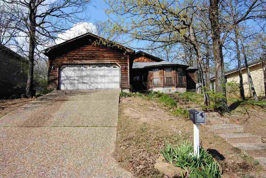 Rustic 3BR, 2BA, in Private Setting!!!Spacious Living Room w/ Wood-burning Fireplace, Kitchen w/TONS of Cabinets & Built-in Desk, Dining, Laundry & 2-car Garage! Beautiful wood Laminate in Living Areas. Master BR features Walk-in Closet and French Doors exit to Back Patio. Large Deck, Greenhouse, Fully Fenced Back yard--Pets w/Owner Approval. Deposit/Fee Based on Type & Size. Minutes to LRAFB!!!