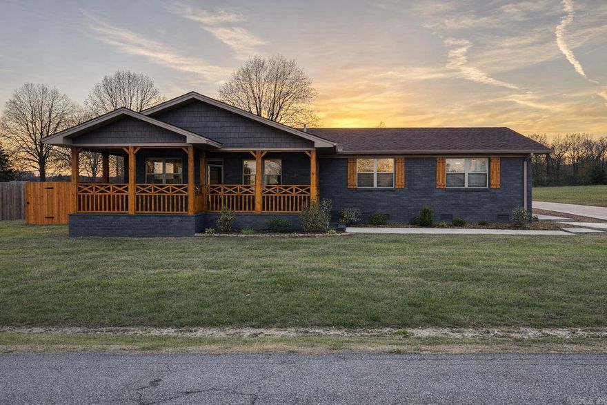 Experience the perfect blend of modern comfort and country charm in this beautifully remodeled home. Featuring a professional custom renovation, this property offers a spacious open-concept for both everyday living and entertainment. The kitchen has stunning granite countertops. a gas stove, stainless steel appliances , and abundance of cabinet space. Luxury vinyl flooring flows throughout the home, complemented by large, spa like showers that add a touch of elegance. Enjoy outdoor living at it's finest with custom built, screened in front porch, and a back porch. Perfect for relaxing and taking in the peaceful sunsets and a large open field. The home also includes and extra large two-car garage, and extra-wide driveway, and a large side patio. Recent upgrades provide peace of mind, including a new privacy fence, septic system, sump pump, and fresh landscaping. Call your Realtor and let's get you in this home before Summer!