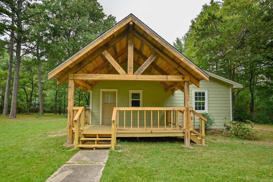 Make this home your own! New siding, new windows, new insulation, new floor joists, new subflooring, nice arched covered porch currently being added, roof is fixing to be replaced. Complete renovation in process. Property can be purchased "As Is" or owner will finish remodel to buyers wishes, colors, fixtures, flooring. Price of home will increase as remodel continues.  Home is nestled on a beautiful 1.194 acres with large scattered trees in Mena city limits.  There is a nice shop/storage building that could easily be converted into a guest tiny house. Beautiful land allowing room to build another home on property.  Close to medical center, shopping, post office, Ouachita mountains, public swimming pool, Wolf Pen Gap trailheads, Bike trails.