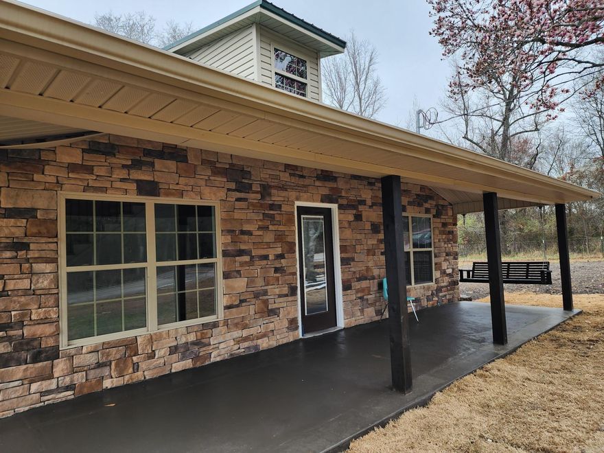 Recently totally remodeled farmhouse with large front porch is located just outside Judsonia & only 5 minutes away from Searcy. Two large bedrooms & a full bath with 10' ceilings was added to back & a 4th bedroom (bonus room) & a bath was added upstairs. The 3 bedrooms & & 2 & 1/2 baths with separate laundry, open living, dining & kitchen are all located on first floor. All counter tops are quartz, includes all new stainless appliances including refrigerator. The island 3.5x 5 island has extra storage, bar & electric. NEW CABINETS, LUXURY VINYL FLOORING, STAINLESS APPLIANCES, HVAC, WOOD STAIRCASE, STAINED WOOD BEAMS, VINYL WINDOWS, SHEETROCK, TRIM & PAINT, ELECRRICAL & PLUMBING. See agent remarks.