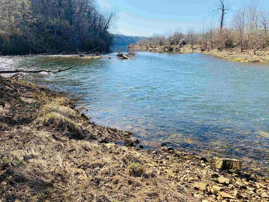 Discover a rare opportunity to own 145.46 +/- acres of breathtaking riverfront land along the White River. This one-of-a-kind property offers long-range bluff views, direct river access, and borders the National Forest on the west side, providing unmatched privacy and a true off-the-grid experience. This land features a great hunting area, home to turkey, deer, hogs, and even bear. Adding to its uniqueness, the property includes your own private 40 +/- acre island. rare find with endless possibilities!  Whether you're looking to develop, build your dream home, or invest in a secluded getaway, this undeveloped land is full of potential, with endless possibilities. Priced at $700,000 – This property is a must-see!