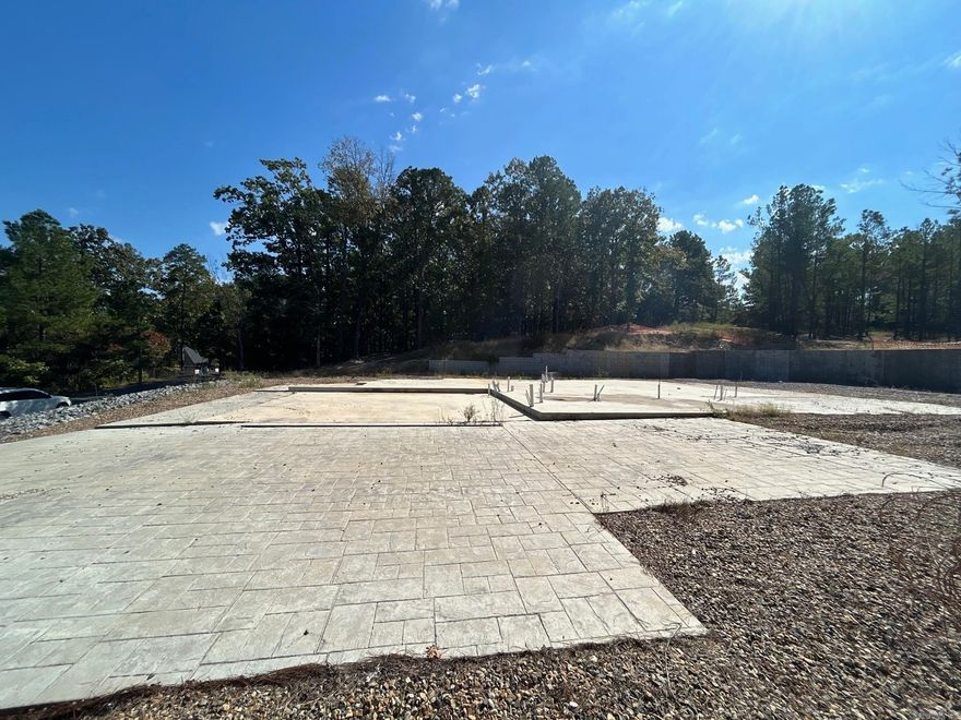 This prime .33-acre lot is fully prepared for your dream home or investment property. The land has been cleared and includes a concrete foundation with all plumbing already in place, saving you time and money. A sturdy retaining wall provides added structure and security. Utilities are available and ready for connection. Located in a peaceful, established area — this property offers the perfect blend of convenience and readiness for immediate construction.