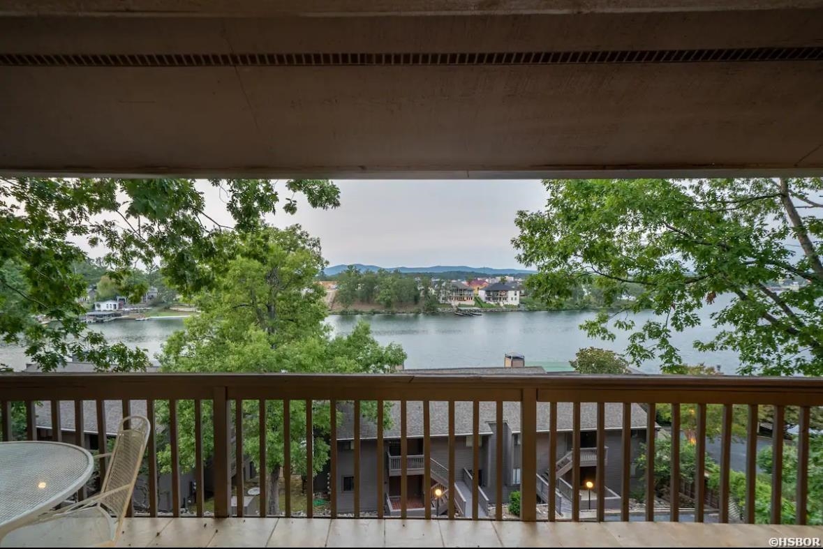 Newly remodeled 2BR/2BA condo on Lake Hamilton. Entry-level unit with no steps! All furniture, furnishings and contents convey to the new buyer. The condo has a beautiful wood burning fireplace and an expansive balcony overlooking the lake. The condo also has a strong track record as a short term rental with very good reviews on Airbnb! Local management in place. Located in the gated community of South Shore with amenities that include a swimming pool, hot tub and tennis court(s).