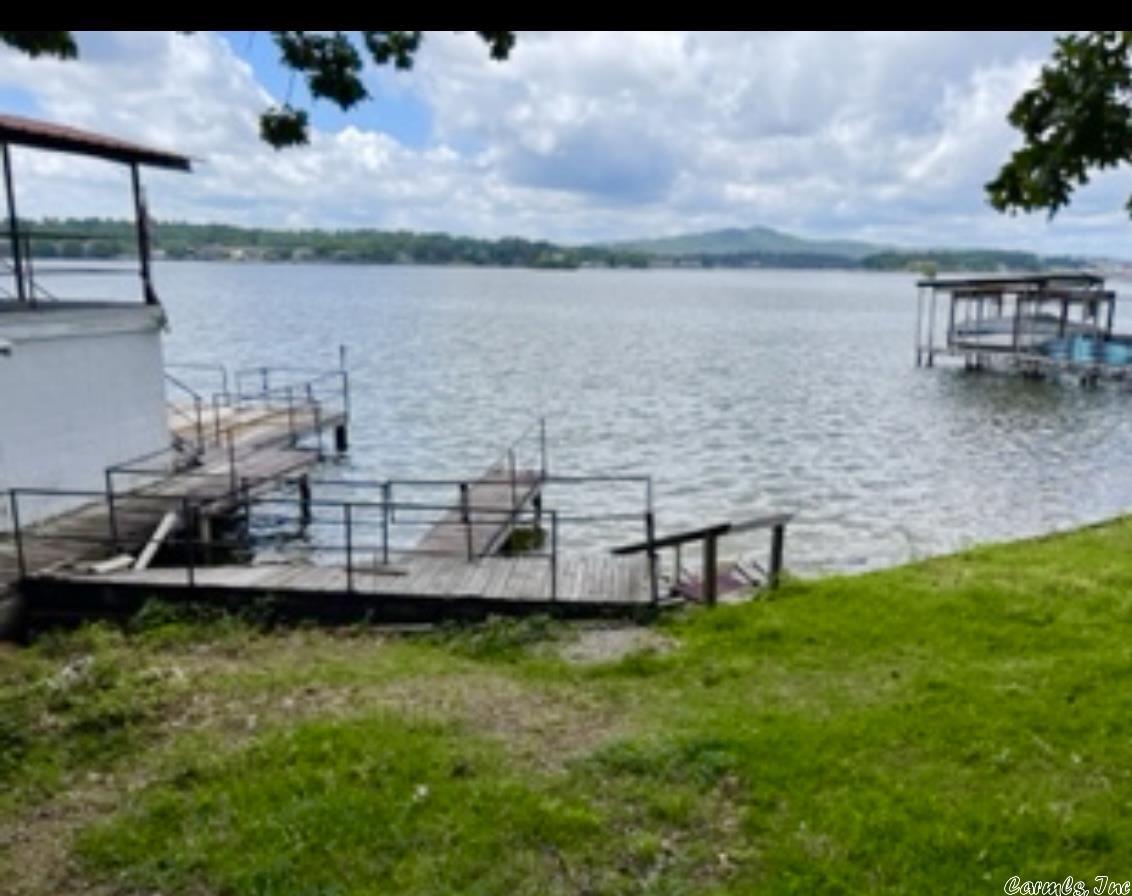 Best Lake Property in Hot Springs!  Main Channel with Breathtaking Views!Use extreme caution if walking on the dock--some Boards are loose or broken!  Property next door also for sale--MLS 22026869