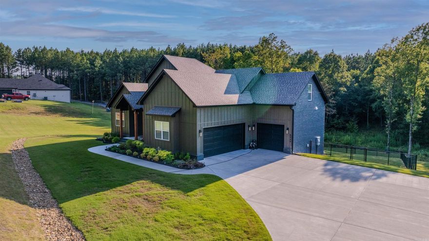 Look at this LIKE NEW HOME built in 2023.The home offers the perfect blend of space, comfort, and natural beauty on over 2 acres with 1 acre beautifully sodded.The home features include stunning high ceilings, open concept living and large windows over looking a beautiful backyard.The open layout highlights the generous living area with tons of natural light and a kitchen with high-end finishes such as quartz countertops and custom cabinetry. The primary suite is located on the main floor with an additional bedroom perfect for a nursey or guest room as well as an additional full bathroom.Upstairs you will find 2 spacious bedrooms, a full bathroom and a second living area.The home also has a newly finished 800 sq ft walkout basement, great for a game room or extra living space. This area leads to a covered patio and the fenced in backyard.The three-car garage provides ample storage  for vehicles and outdoor equipment. This stunning home has been designed for both comfort and functionality as well as providing multiple spaces for entertaining all while enjoying this beautiful, natural setting.MOTIVATED SELLERS
