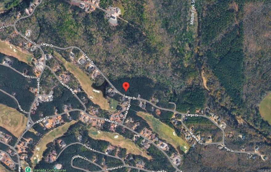 Build your dream home in the beautiful Hot Springs Village on this well-positioned lot located near Granada Golf Course. Enjoy peaceful views overlooking the reserve and the natural beauty that makes Hot Springs Village such a sought-after destination. Whether you're looking for a full-time residence or a getaway retreat, this property offers a setting surrounded by golf, nature, and the lifestyle Hot Springs Village is known for. Conveniently located near lakes, golf and Village amenities, this is a great opportunity to own property in one of Arkansas’ premier gated communities.