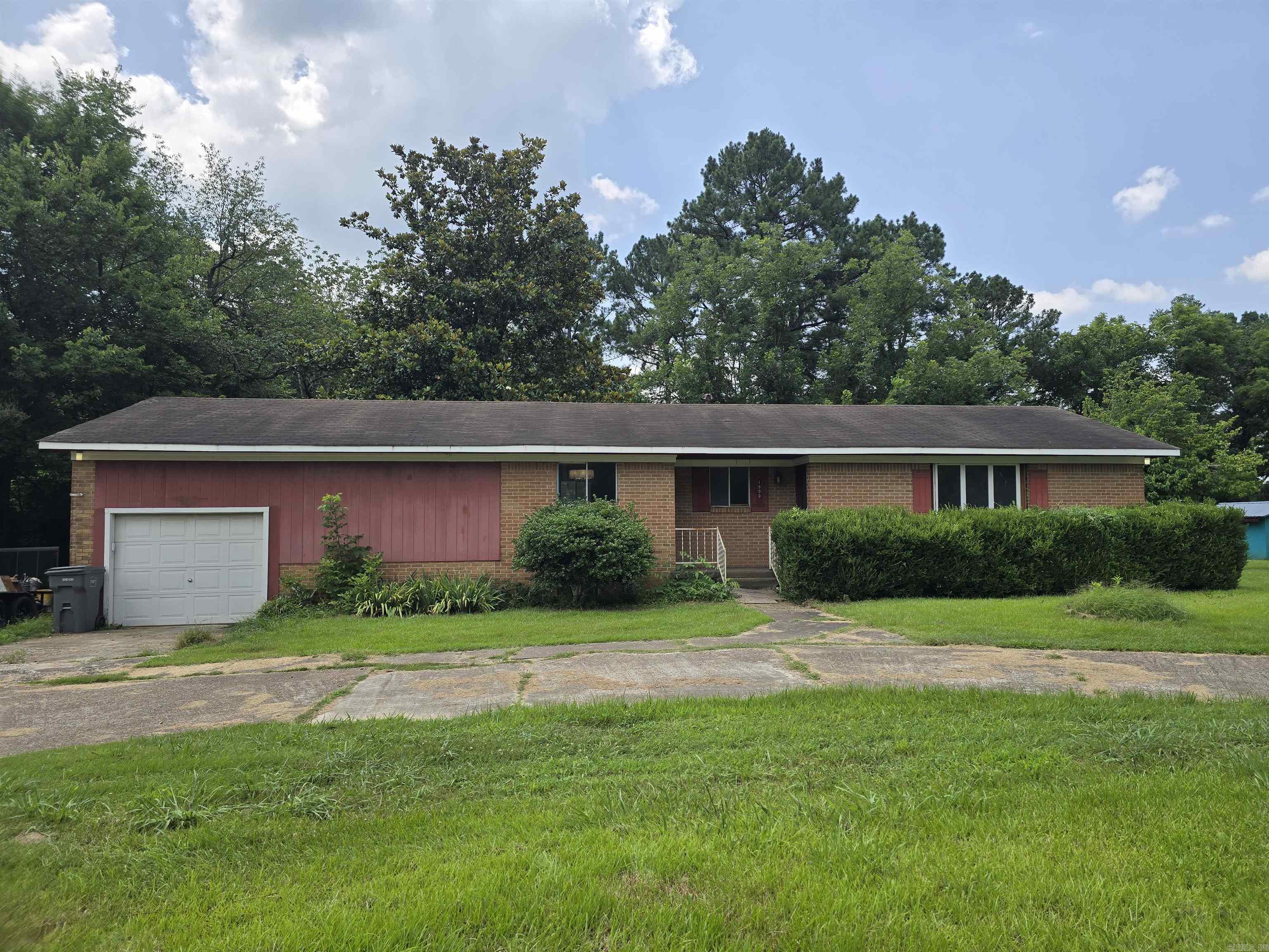 2025 remodeled 3 or 4 bedroom/2 bathroom house located only 2 miles from Lyon College in Batesville, Arkansas! This charming home has plenty of space for a large family and boasts appx 2,400 sq ft which includes an almost 500 sq ft unfinished basement! Attached to the house is a single car garage with doors on both sides making driving through to the back yard easy! Updates on the house include new LVP flooring throughout with the exception of the HUGE den which has new carpet! Both bathrooms have been remodeled almost entirely preserving only the vintage tub in the main bathroom. New countertops, refurbished wood cabinets, new appliances, new lights, new ceiling fans, some updated electrical and plumbing, new french doors off of the den, and much more! The 4th bedroom could be an office or a bedroom! The seller is willing to give additional credits for closing costs or further renovations as well. This house is still being worked on and will continue but you can see it today before anyone else grabs it! Investor and agent owned.