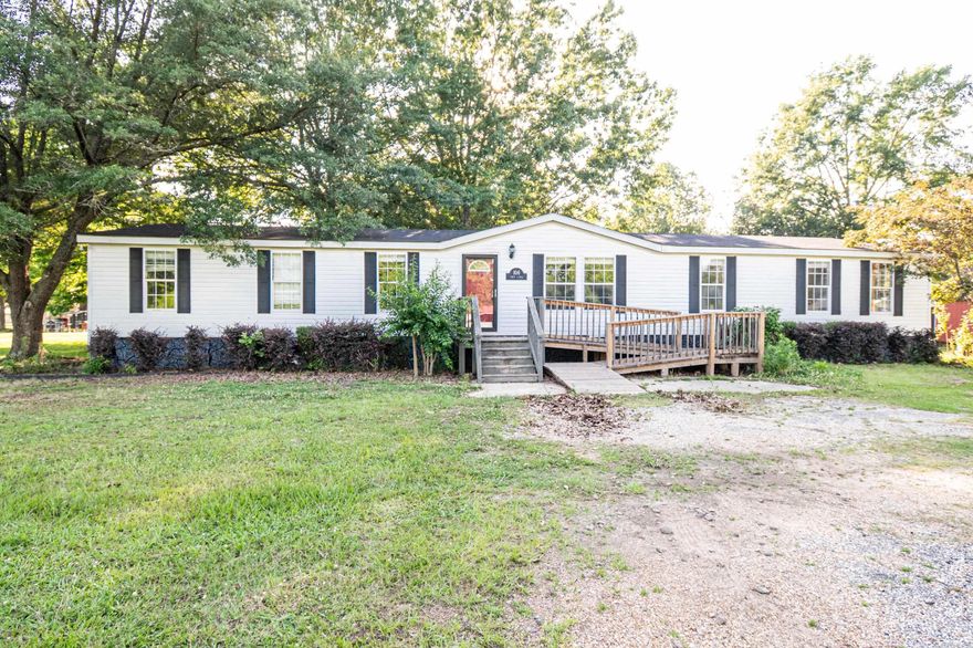 Welcome to this well-maintained 2012 mobile home that offers room to spread out and live comfortably! Boasting 4 spacious bedrooms, 2 full bathrooms, and two generous living areas, this home is perfect for growing families, entertaining guests, or creating the perfect work-from-home setup.  You'll love the large kitchen with ample counter space and storage—ideal for home chefs or anyone who enjoys gathering around a central hub of the home. Whether it's a casual breakfast or a holiday feast, this kitchen can handle it all.  Step outside and enjoy the perks of a fully fenced backyard—perfect for pets, kids, or outdoor get-togethers. There's also a 4-car carport, offering plenty of covered parking and storage space.  Conveniently located and only in need of some slight TLC, this property offers both comfort and functionality in one affordable package. Don’t miss out—schedule your showing today. *Red storage shed does not remain*