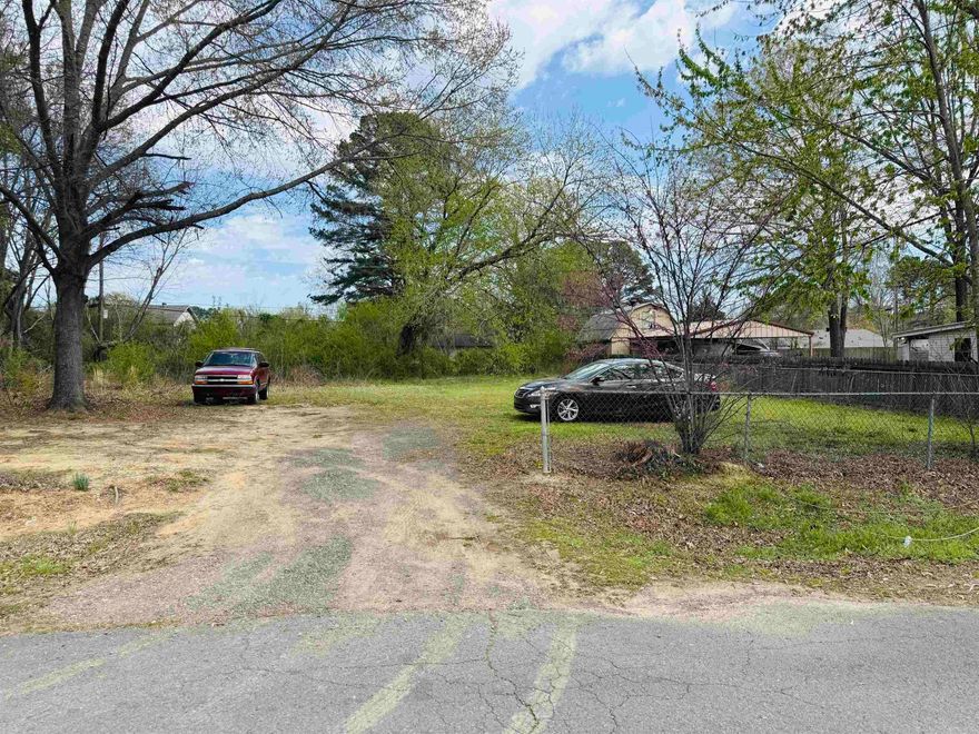 Nice lot available in Conway. This lot is .32 of an acre. It is fenced with chainlink fencing. Close to all kinds of ammenities here in Conway. Use to be a dwelling on the property not sure about the utilities.  No property disclosure available. Seller just acqquired and has not occupied property. Buyer due diligence.   Agents see remarks.