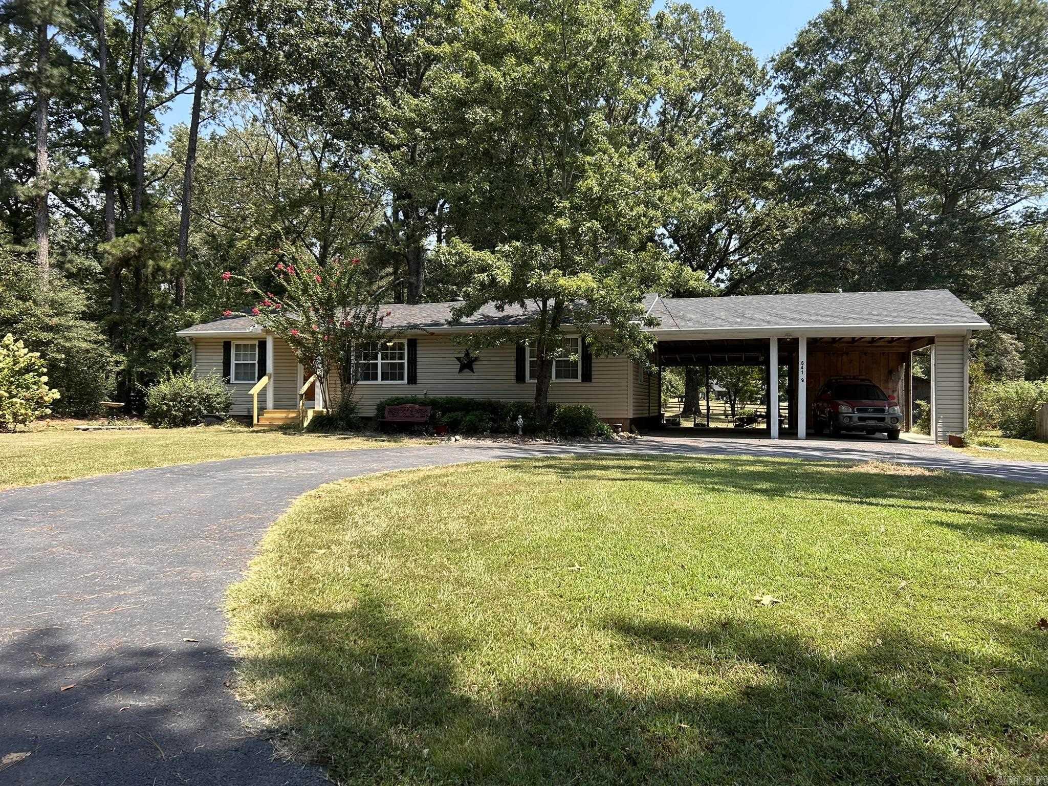 A delightful place to call home. Neat one owner 3 bedroom 1-1/2 bath all on 1.47 acres. You will enjoy the double carport w/ patio. This 1368 sq. ft. home was built in 1963 w/ an addition in 1973 and has been well maintained by the original owners. Recent updates include a roof that is only 4 years old, a brand-new septic system, and ongoing electrical improvements. In addition to the main home, the property offers multiple outbuildings: a small guest/hobby house and two versatile shop buildings, providing ample space for projects, storage, or hobbies. Documentation is available for all completed work. The acreage provides room to spread out while still being conveniently located, and the home qualifies for Rural Development financing, meaning no money down for approved buyers. This property combines solid updates, flexible space, and country charm just minutes from Jacksonville amenities.