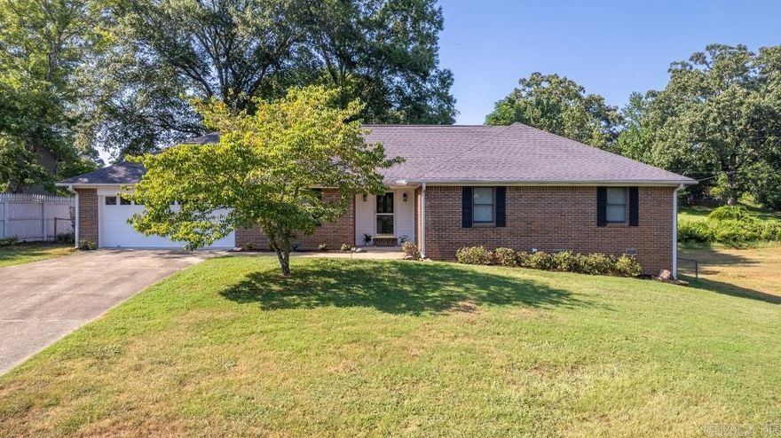 COMPLETELY REMODELED! This all brick beauty has been transformed into a bright and airy, modern home. New floors, paint and fixtures throughout! Updated kitchen and baths with granite! The eat in kitchen opens into the sunroom overlooking a fully fenced backyard. The formal dining room is perfect for your large family gatherings. The living room is inviting and features a fireplace. The master bedroom features an upscale bathroom and large walk in closet. Huge laundry room with tons of storage. Move in ready with a 2 car garage and under house storage and a whole home GENERATOR that runs on propane. You'll never be left in the dark. This one won't last long!