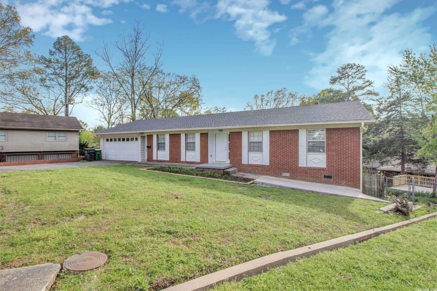 MID-TOWN!!!  Four Bedroom, Three Bathroom Home with updates throughout while still maintaining some of the original charm. Full kitchen update including new flooring, beautiful granite countertops, all new stainless steel appliances. This beautiful home sits in a quiet cul-de-sac and has plenty of room on the deck, under the covered patio or in the backyard for outdoor entertaining.  The upper level interior includes an oversized family room, breakfast area, kitchen with a large pantry, three bedrooms and two full bathrooms.  The lower level is complete with another large living area with wet bar where you can cozy up to the fireplace, another bedroom and full bathroom.  The large mechanical room provides ample storage and even has a workshop area.  This is a rare find!!!