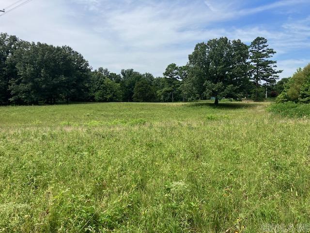 9 Acres M/L with Highway 166S frontage. This land has a nice pond, a tractor barn, is mostly open and has several good building locations. Power runs across the property and rural water is available along the road. Property to be surveyed before closing. Build your dream home today!