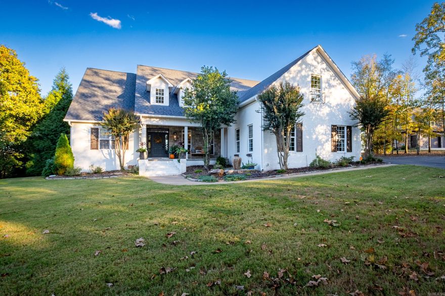 Picturesque, rare private property with breath taking views nestled on 5.27 acres on Round Mountain. This painted brick beauty is an entertainers dream complete with inground pool, covered outdoor pavillion/fireplace/TV/grill area, converted garage golf simulator, oversized game room. Open living with 2 story ceiling, large windows along back to capture the view and light. Beautiful stone fireplace, hardwoods and built-ins in great room. Versatile floor plan - keeping room off kitchen, loft/office, 3 optional dining areas. Breakfast bar and island in kitchen. Hardwoods in master suite - completely renovated bath, soaker tub, tile shower. Utility sink in laundry and convenient laundry chute. New roof and gutters in 2023 with 30 year shingles and 10 year warranty. Golf simulator room has mini-split air system and is not included in square footage. Simulator includes computer, software, simulator, projector, impact hitting mat and impact screen. Seller will convey simulator with acceptable offer. Low Conway Corp utilities. Serenity at it's finest!