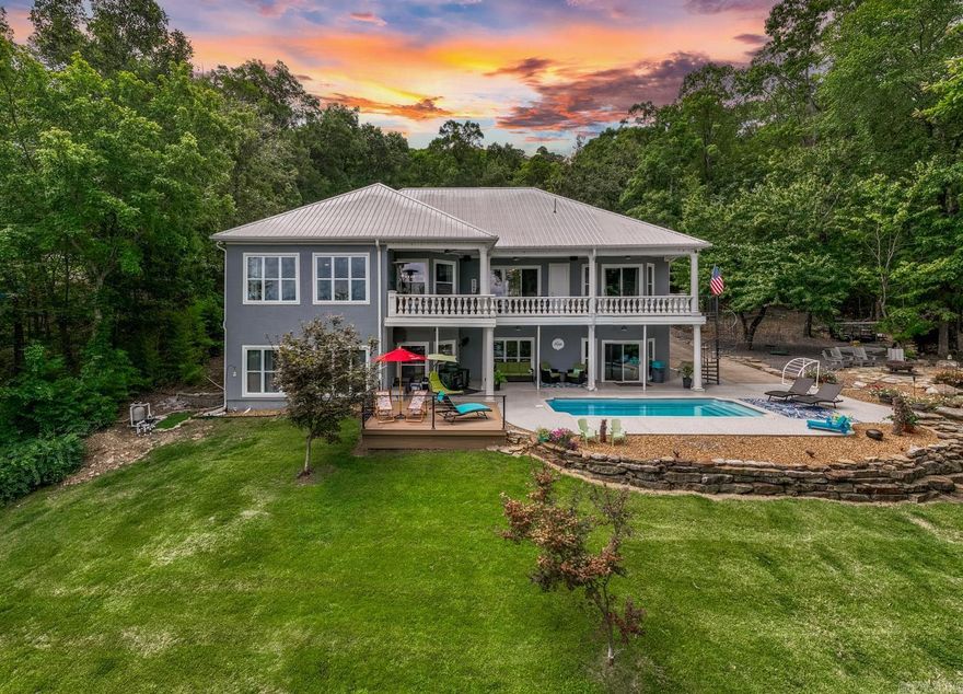 STRONG rental history for this beauty with over $60,000 in bookings so far for 2026, you will find this exquisite LAKEFRONT property offers the perfect blend of elegance & comfort & gorgeous lake views. Boasting 6 generously sized bedrooms & 3 full baths, plus 3 half baths, this residence ensures ample space for both family & many guests. The chef’s kitchen is equipped with top-of-the-line appliances, sleek countertops, & custom cabinetry. The home features high-end finishes throughout, including luxurious flooring, stylish fixtures, & expansive windows that capture stunning lake views. Enjoy outdoor living at its finest with an in-ground salt water pool, & multiple entertaining areas with a fire pit perfect for hosting gatherings or relaxing in style.The property includes a convenient circle drive for easy access & ample parking. More great features include a whole home generator & Sonos sound system inside/outside. Whether you're seeking a peaceful retreat or an entertainer's paradise, this lakefront home on Greers Ferry Lake offers the ultimate in luxury living. Don’t miss the opportunity to make this stunning property your own. Schedule your private showing today!