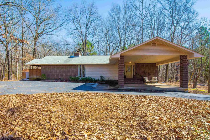 Wonderful 3 acres property close to Rolling Hills Golf Course. Just a short distance from city limits. Spacious open plan, living room with vaulted ceiling and wood burning fireplace and built-ins. Two separate master suites with interesting barrel ceiling and new renovated bathroom. Crawl space has been fully insulated with moisture barrier, outstanding property.