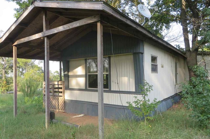 Country living with small acre can be yours...Great Lot to build a home or put a mobile home on. Bank Owned, SOLD AS IS.