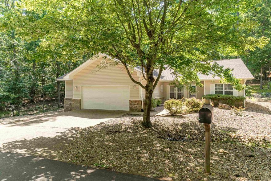 Move-in Ready light and bright one level 3 bedroom home with 2 full baths conveniently located near West Gate Shopping and all its convenient amenties.  Inside you'll find a divided bedroom plan; spacious living room with wood burning fireplace; dining room; separate laundry room with washer and dryer included; and large kitchen with breakfast bar, eat in area and pantry, plus a refrigerator and new stove! Two car garage has separate workshop or handy storage area-great for keeping your tools, bikes, or extras out of the way.  Outside you'll find a partially covered back patio with small grass area that's perfect for pets.  Come see all that this lovely property has to offer!  No Sellers Property Disclosure.  Agents, see remarks for additional details.