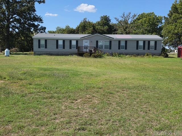 GREAT LOCATION! Spacious home on 2.8 acres ā just 1 mile from the city limits. Enjoy the perfect blend of country privacy and city convenience with this 2,160 sq ft manufactured home set on 2.8 acres. Inside, youāll find 4 bedrooms and 2 full baths, including a private master suite with a cozy sitting area, large walk-in closet, and a generous master bath. Also features a den with a wood-burning fireplace. Eat in kitchen with lots of cabinet storage. Brand new central heat and air in August 2025, plus a propane hookup with a 100-gallon filled tank ready to go. Metal roof. All appliancesāincluding washer and dryer stay with the home. City utilities and septic.