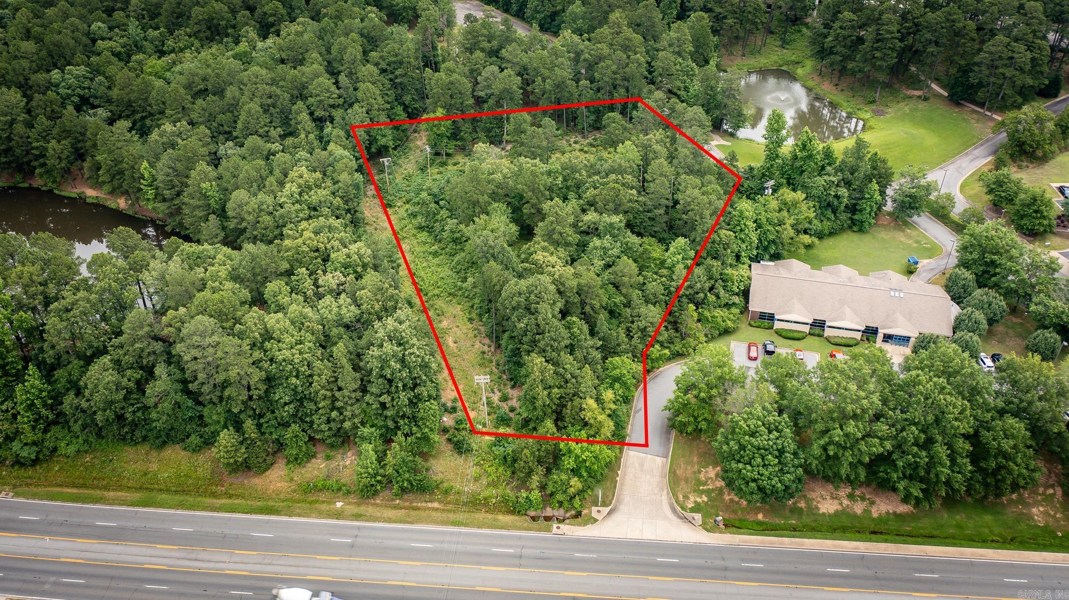 Prime 1.56+/- acre commercial development lot located along heavily trafficked Highway 10/Cantrell Road commercial corridor in fast-growing West Little Rock! 42,000 VPD and POD zoning, this property is perfect for the construction of class-A office building. Shared easement in place. Located near Pleasant Ridge Towne Center, Kroger Marketplace, the Centre at 10 retail complex, Starbucks, Iberia Bank, First Service Bank, Keller Williams Realty, American Abstract, & more! Easy access to I-430, I-630, I-40, I-30, and Hwy 530.